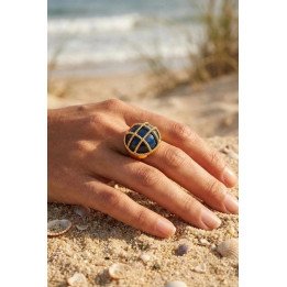 Bague dorée avec pierre bleue – Design cage