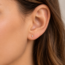 Puces d’oreilles zircone en acier doré en 2 mm